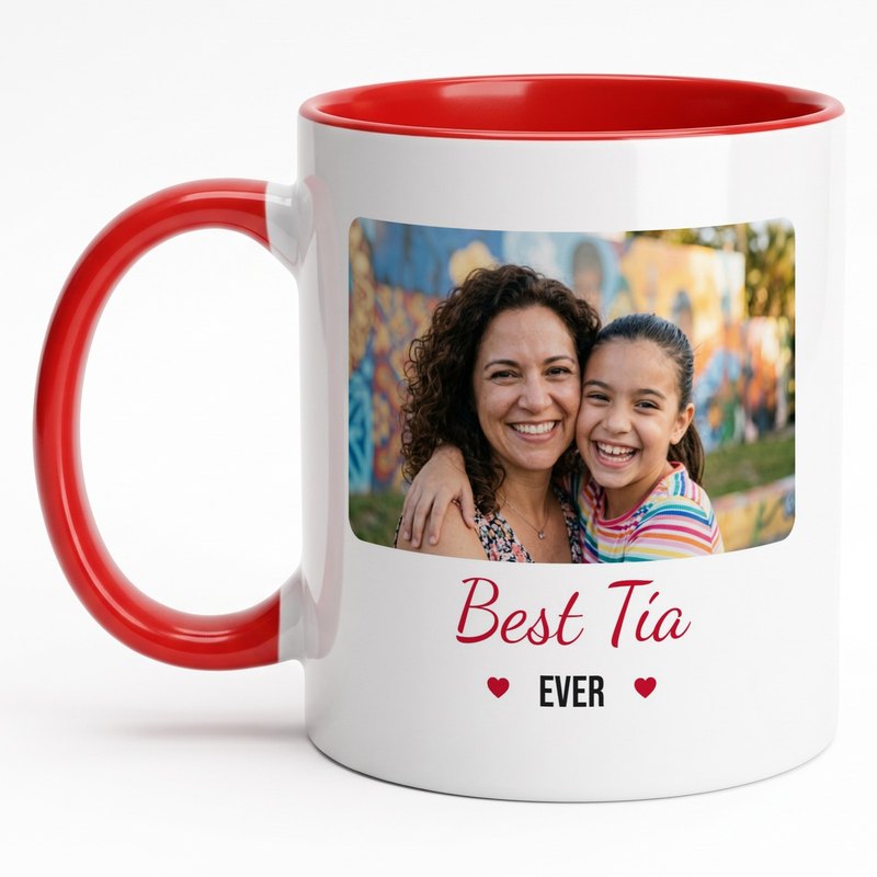 A red-rim "Best Tía Ever" mug with an aunt and her niece cheek to cheek