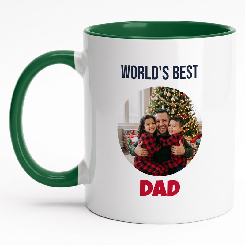 A forest-green-rim "World's Best Dad" mug with a dad and his two kids in plaid pajamas hugging him on Christmas morning